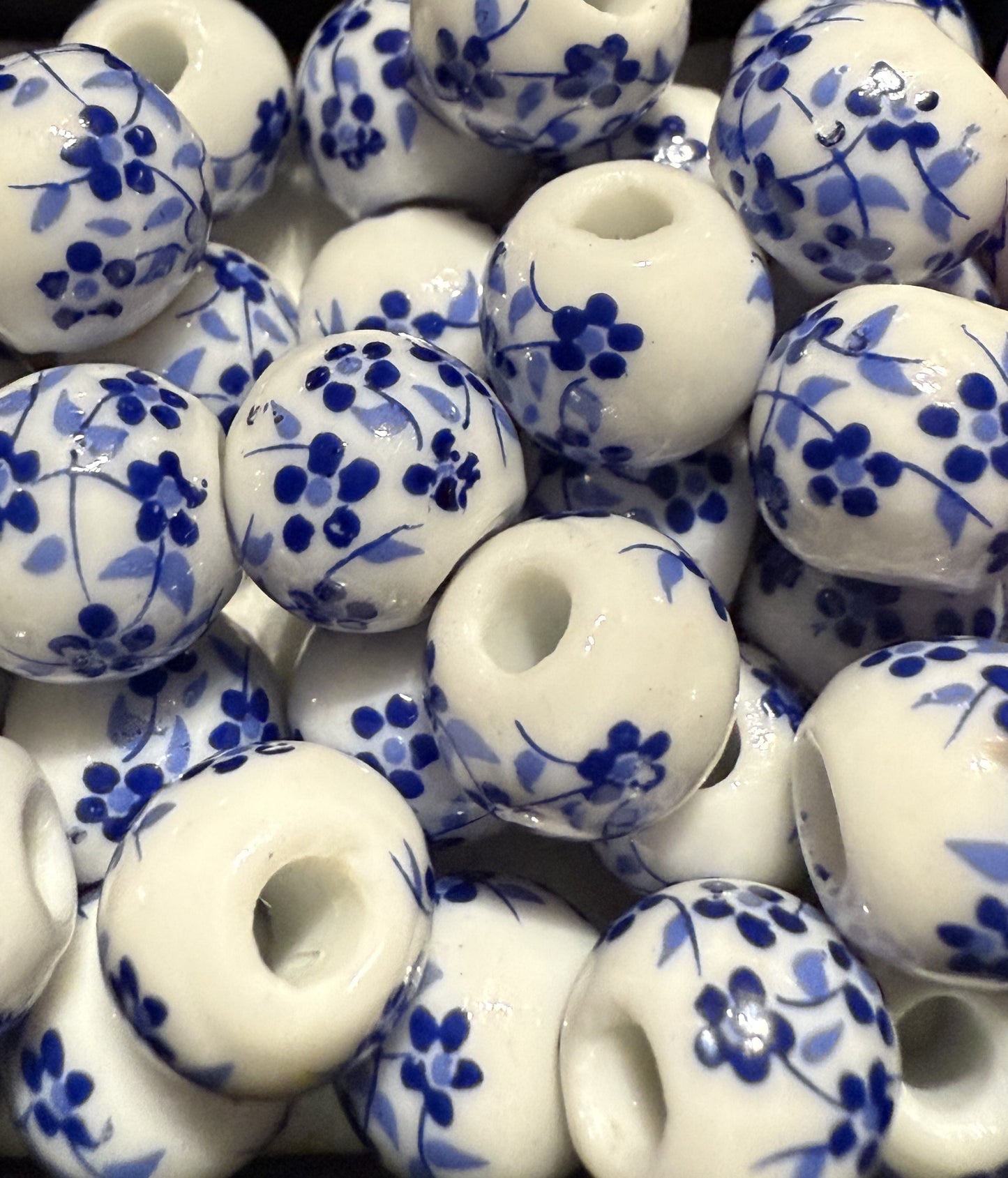 porselein kralen met bloemmotief ( blauw/wit )