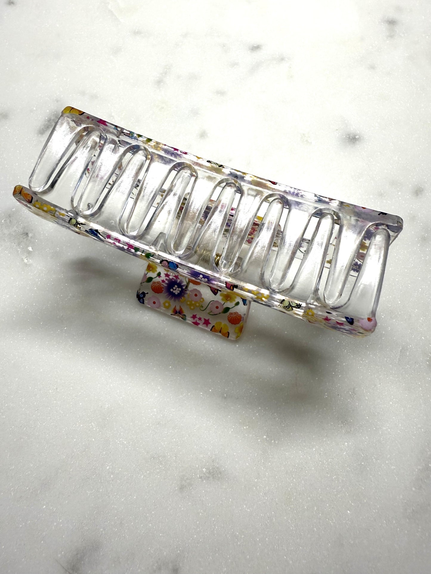 haarklem bloemen en vlinders