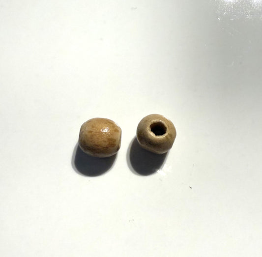 Beige houten kraal 7mm