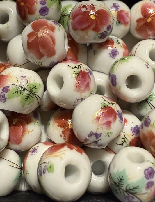 Porselein kralen bloemmotief ( roze/rood/wit