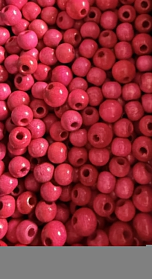 fuchia roze houten kralen