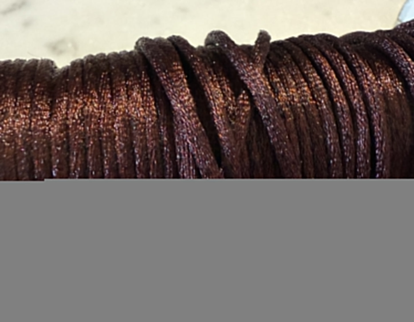 Satijnkoord donkerbruin ( prijs is per meter )