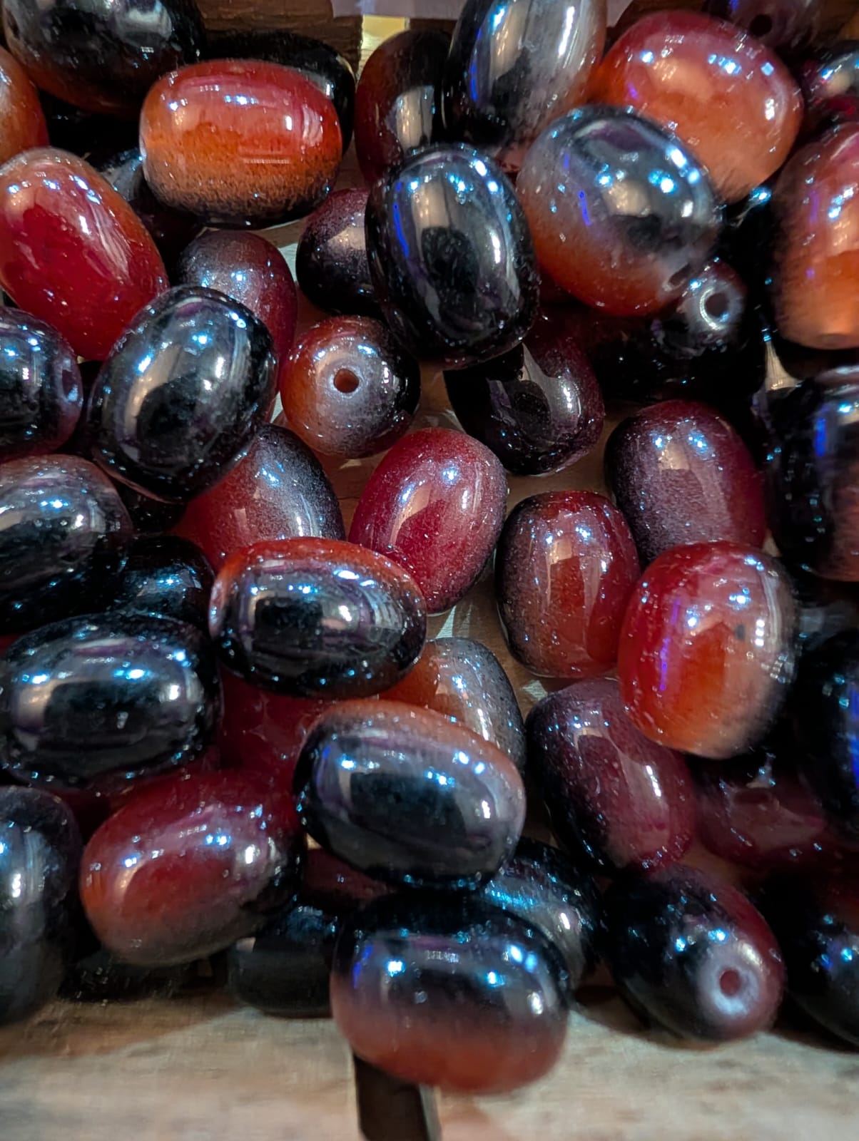 Rood/zwart/bruine glaskraal